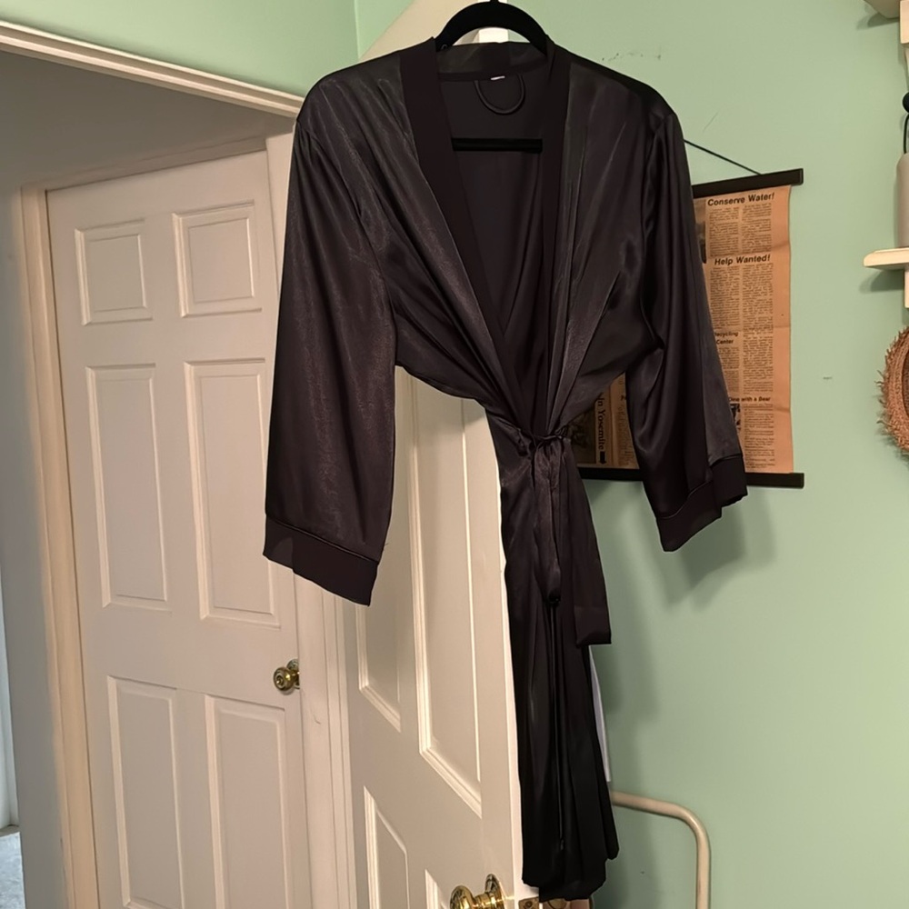Black silk robe with shear lining.